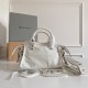 BALENCIAGA  Neo Cagole City XS Handbag In Lambskin - White