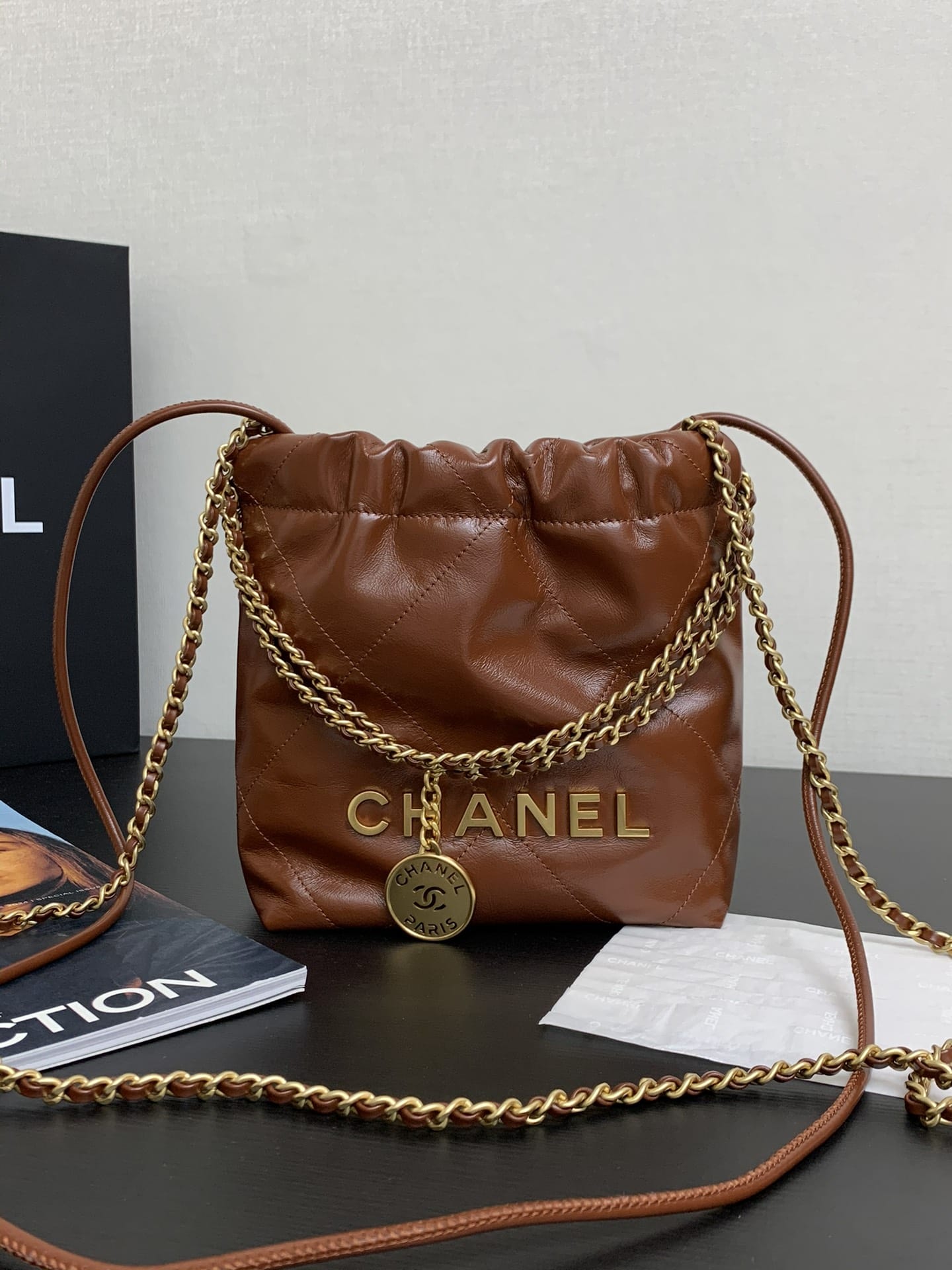 CHANEL 22 Mini Hobo Bag in Shiny Calfskin - Dark Beige