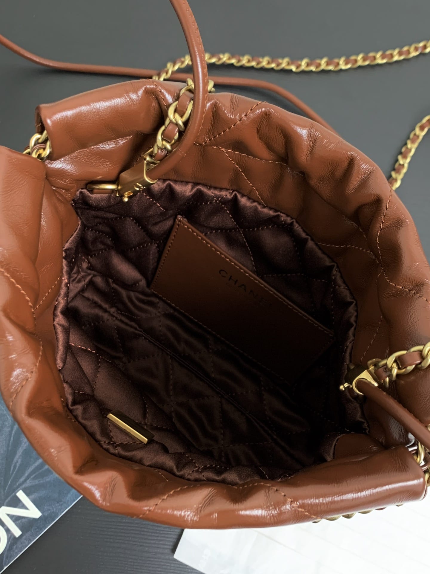 CHANEL 22 Mini Hobo Bag in Shiny Calfskin - Dark Beige