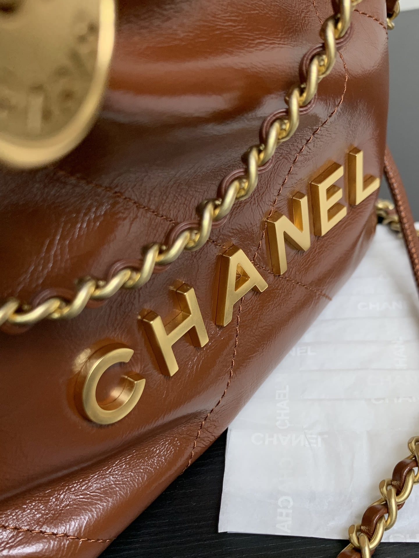 CHANEL 22 Mini Hobo Bag in Shiny Calfskin - Dark Beige