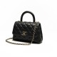 CHANEL COCO Top Handle Mini Flap Bag in Grained Calfskin - Black