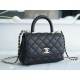 CHANEL COCO Top Handle Mini Flap Bag in Grained Calfskin - Black