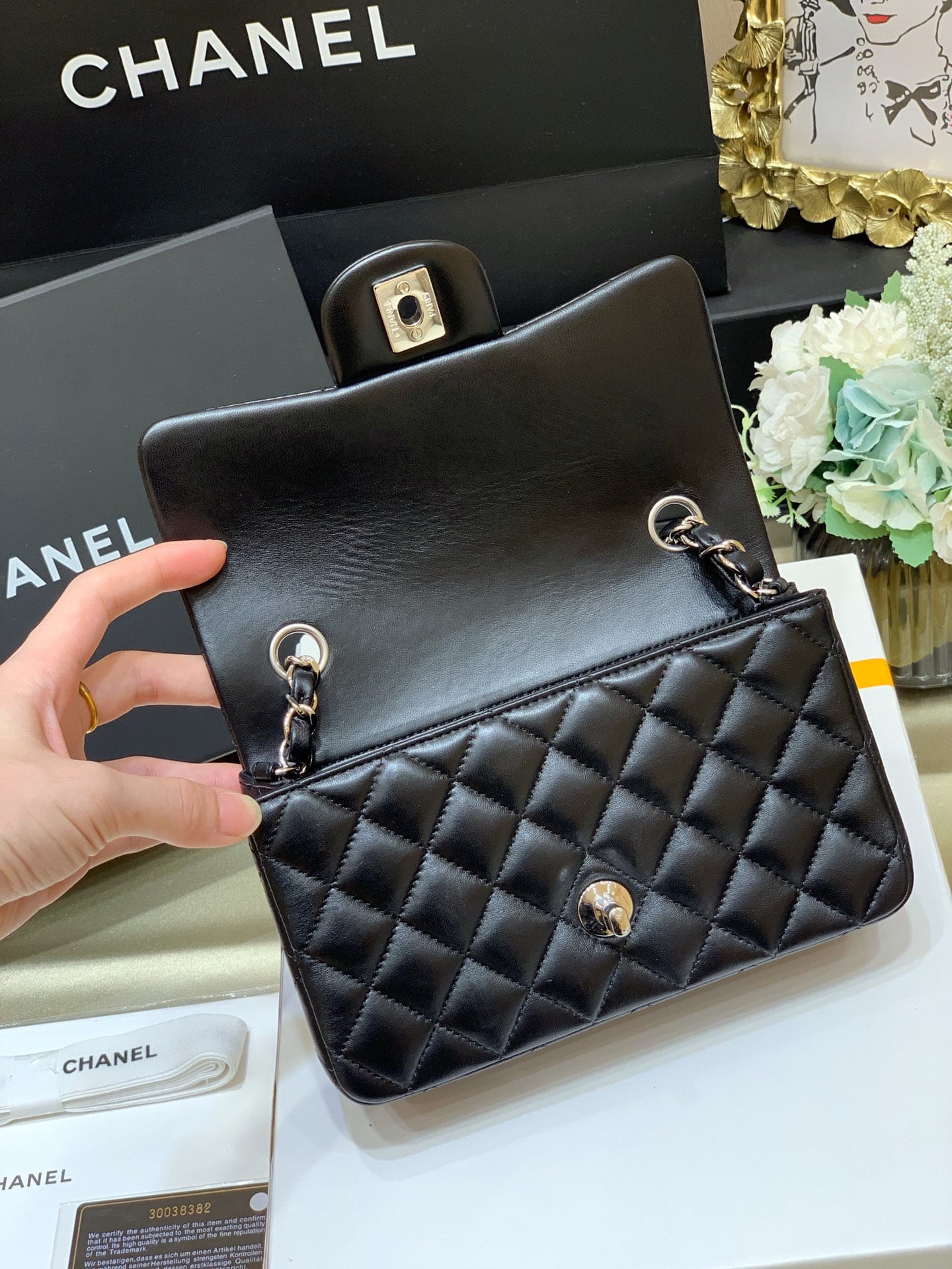 CHANEL Mini Classic Flap Bag in Lambskin- Black