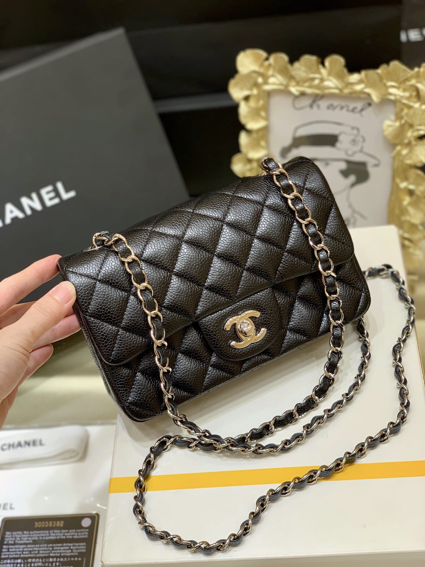 CHANEL Mini Classic Flap Bag in Grained Calfskin- Black