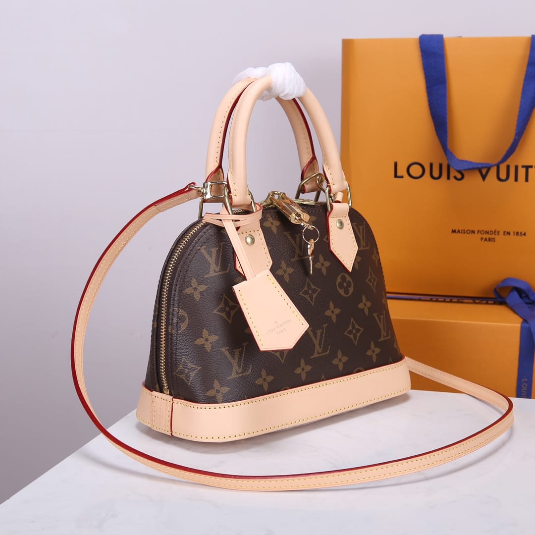 Louis Vuitton Alma BB Handbag in Monogram Coated Canvas