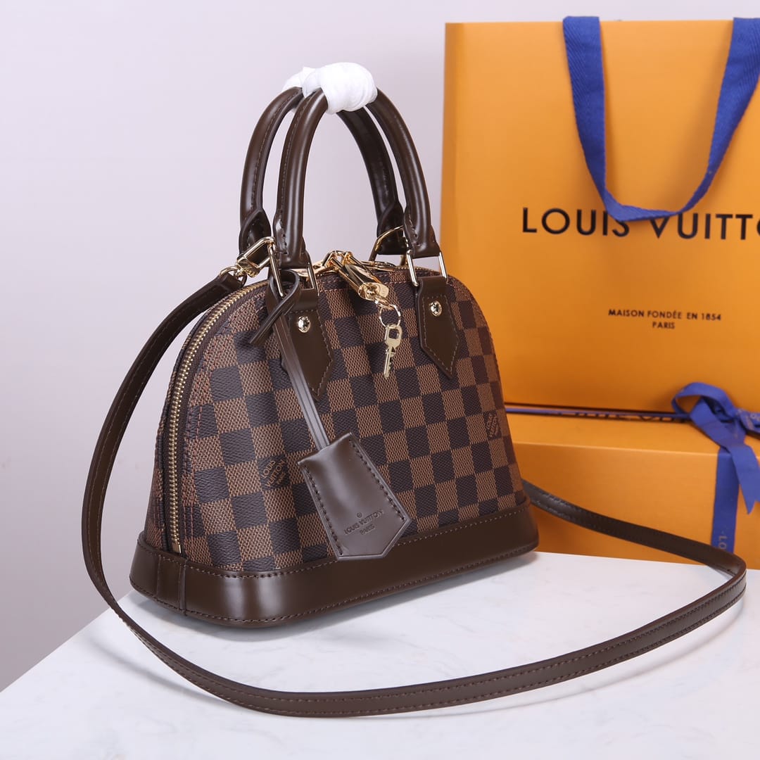 Louis Vuitton Alma BB Handbag in Damier Ebene Coated Canvas