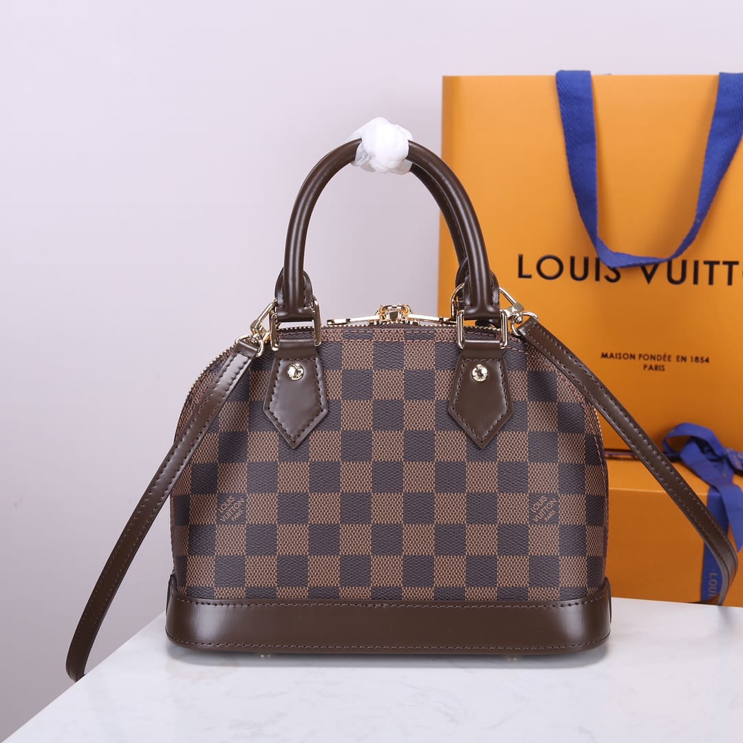 Louis Vuitton Alma BB Handbag in Damier Ebene Coated Canvas