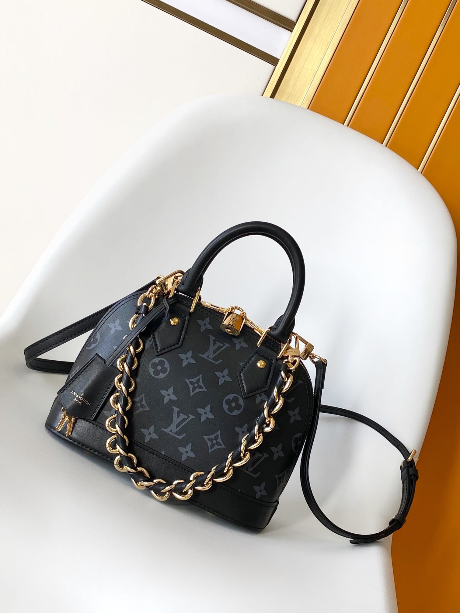 Louis Vuitton Alma BB Handbag in Smooth Calfskin - Black & Monogram