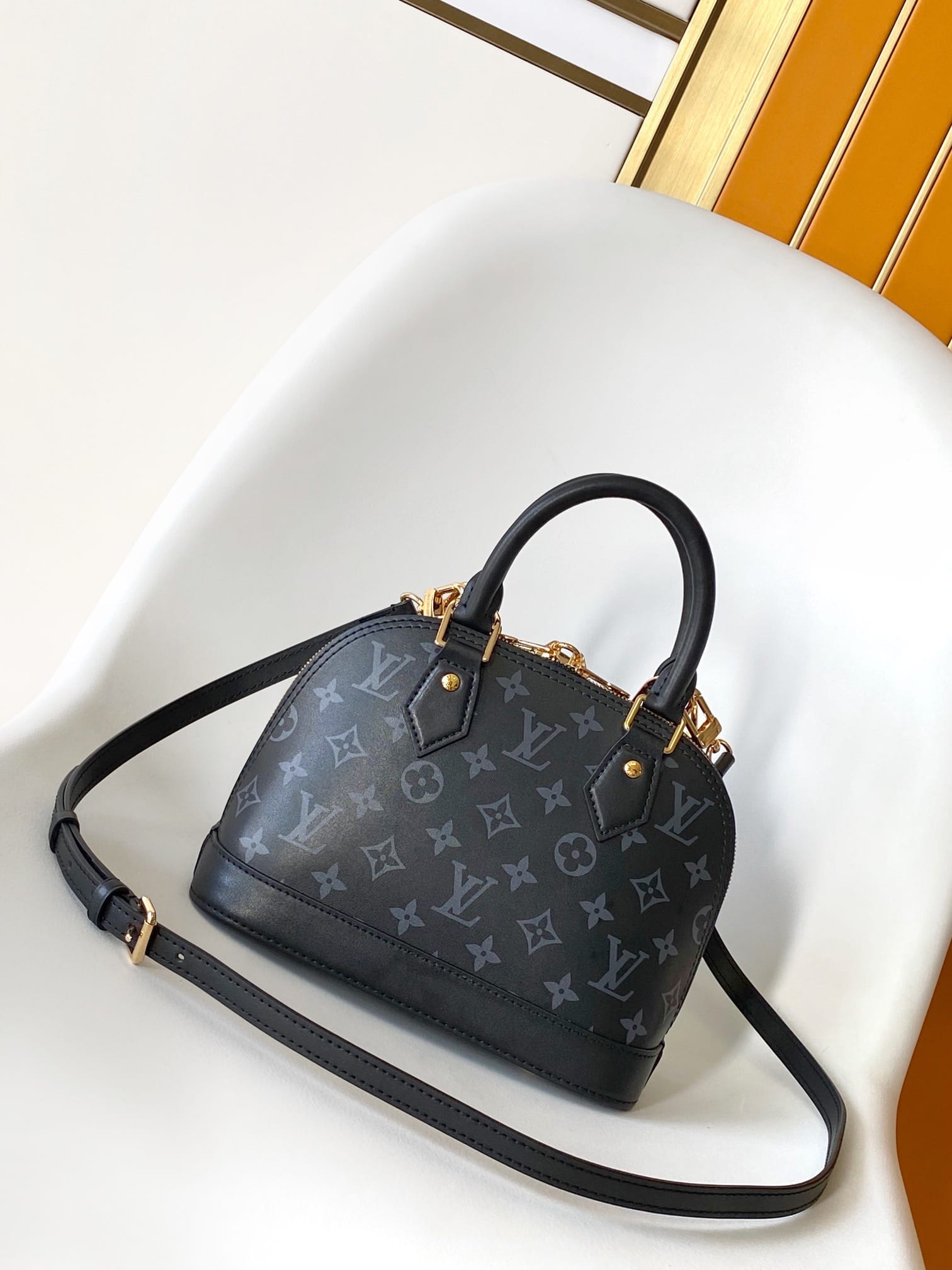 Louis Vuitton Alma BB Handbag in Smooth Calfskin - Black & Monogram