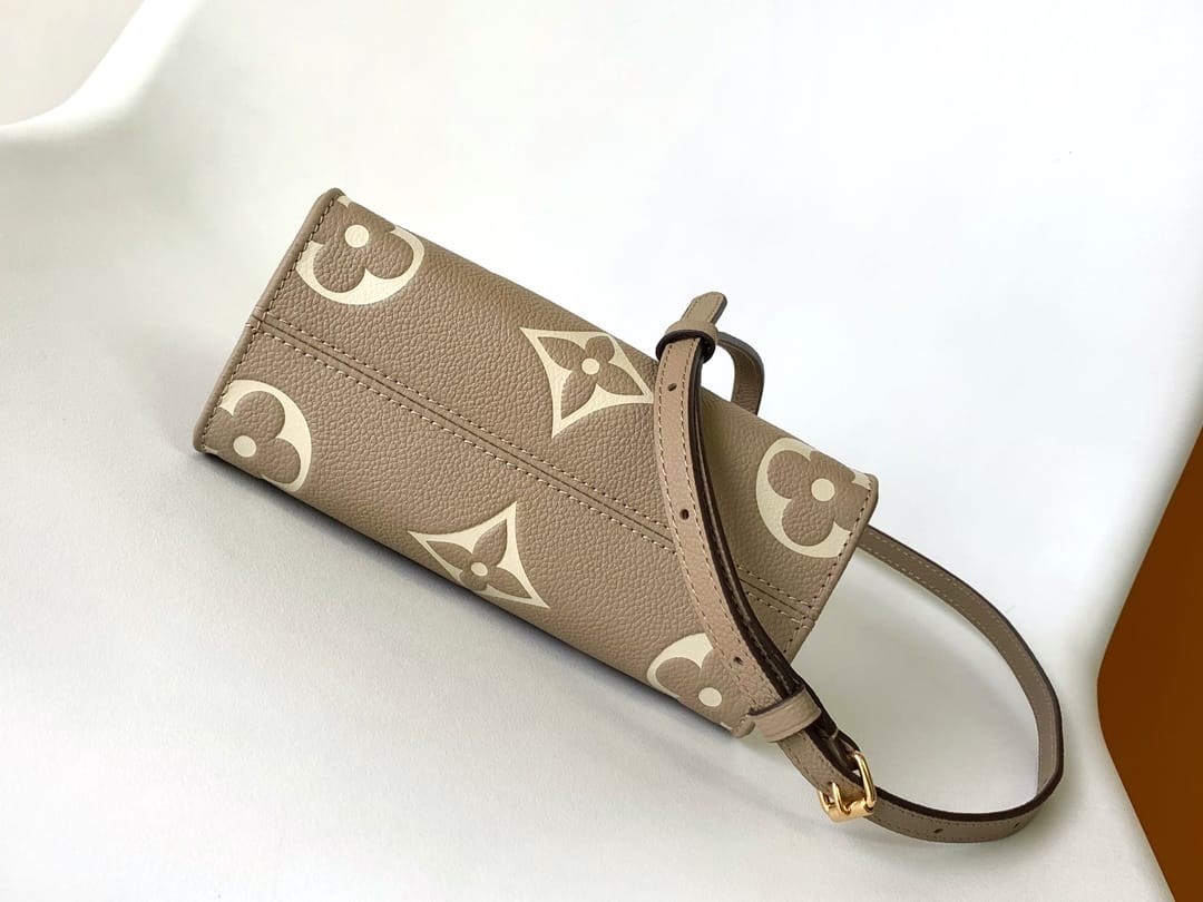 Louis Vuitton OnTheGo BB Toto Bag in Bicolor Monogram Empreinte Leather - Gray/Cream