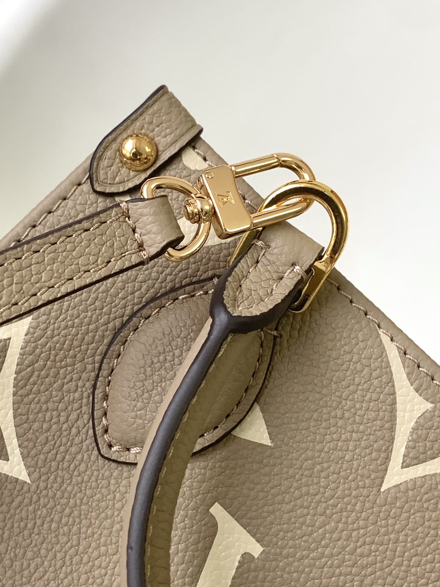 Louis Vuitton OnTheGo BB Toto Bag in Bicolor Monogram Empreinte Leather - Gray/Cream