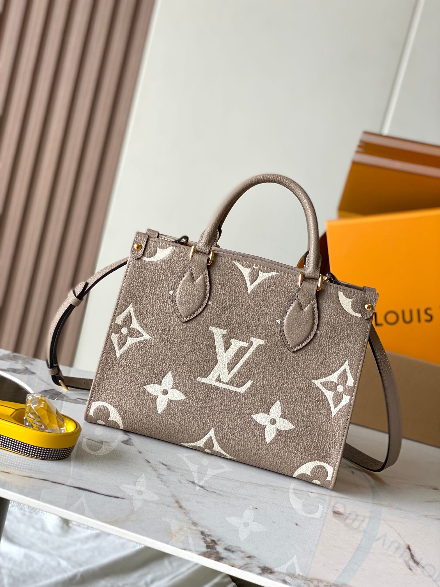 Louis Vuitton OnTheGo PM Toto Bag in Bicolor Monogram Empreinte Leather - Beige/Cream