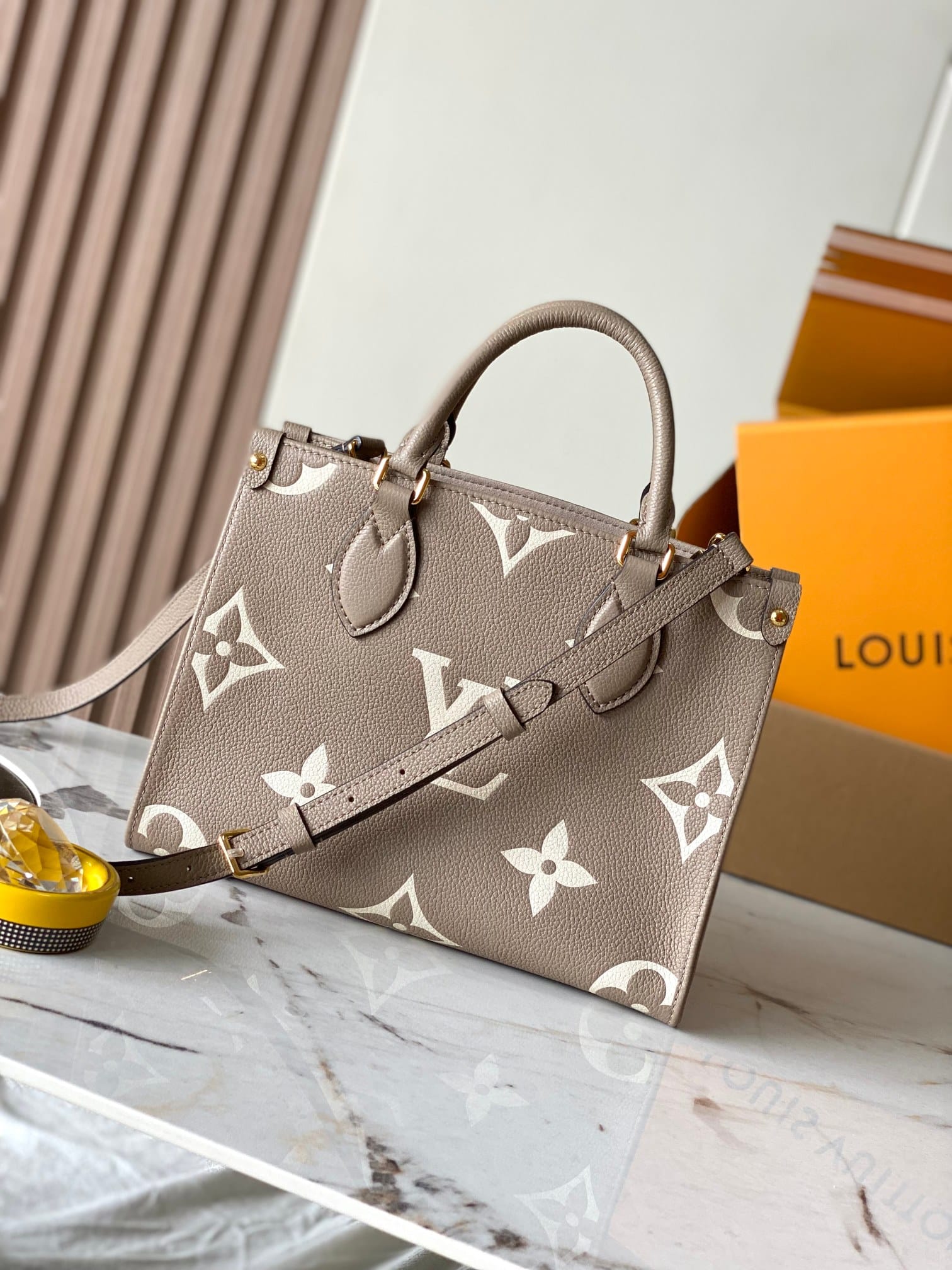 Louis Vuitton OnTheGo PM Toto Bag in Bicolor Monogram Empreinte Leather - Beige/Cream