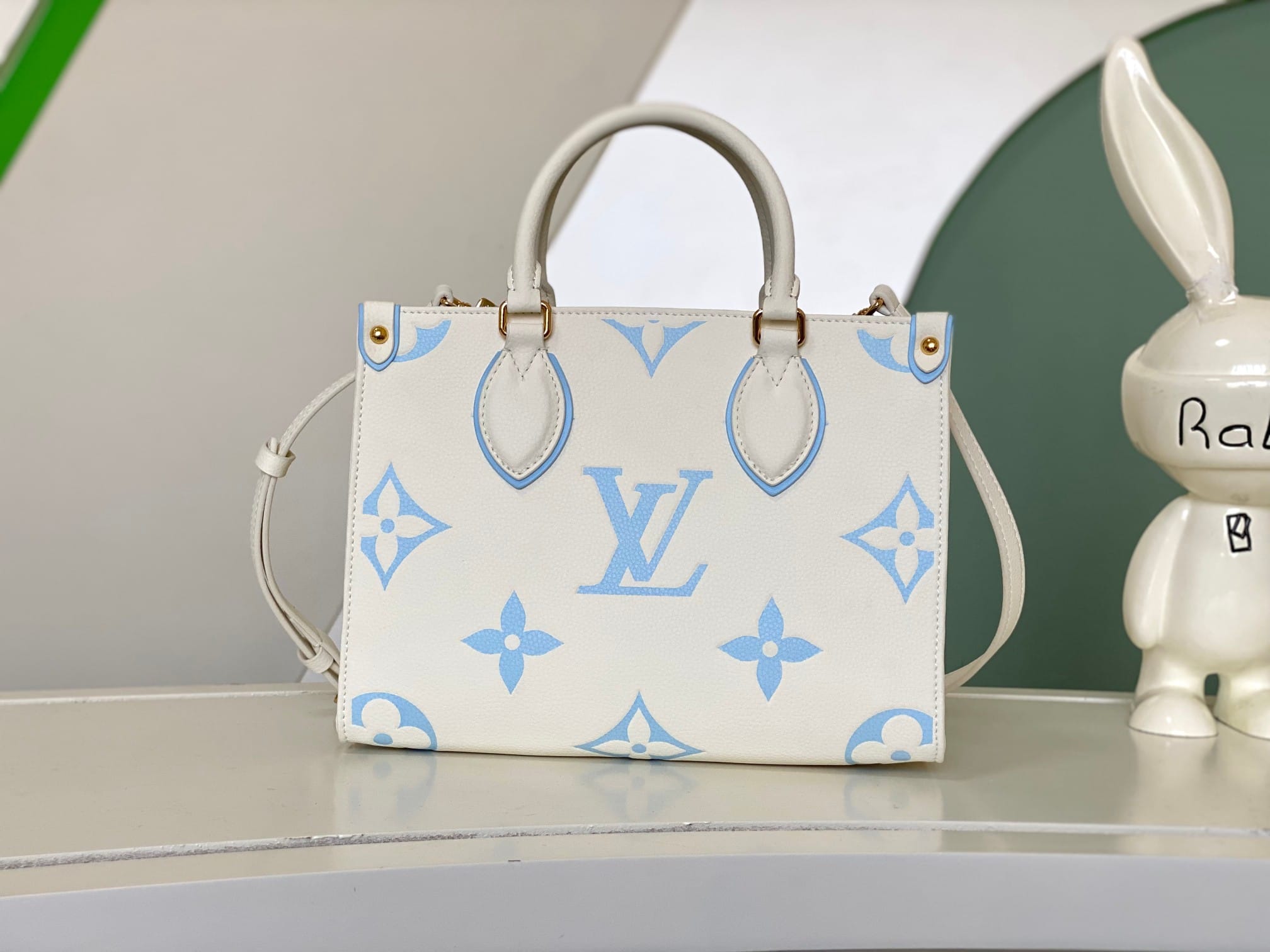 Louis Vuitton OnTheGo PM Toto Bag in Bicolor Monogram Empreinte Leather - Latte/Candy Blue