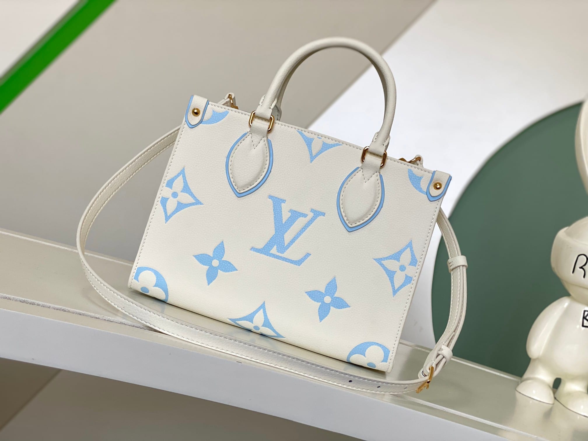 Louis Vuitton OnTheGo PM Toto Bag in Bicolor Monogram Empreinte Leather - Latte/Candy Blue