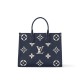 Louis Vuitton OnTheGo MM Toto Bag in Bicolor Monogram Empreinte Leather - Navy Blue/Cream