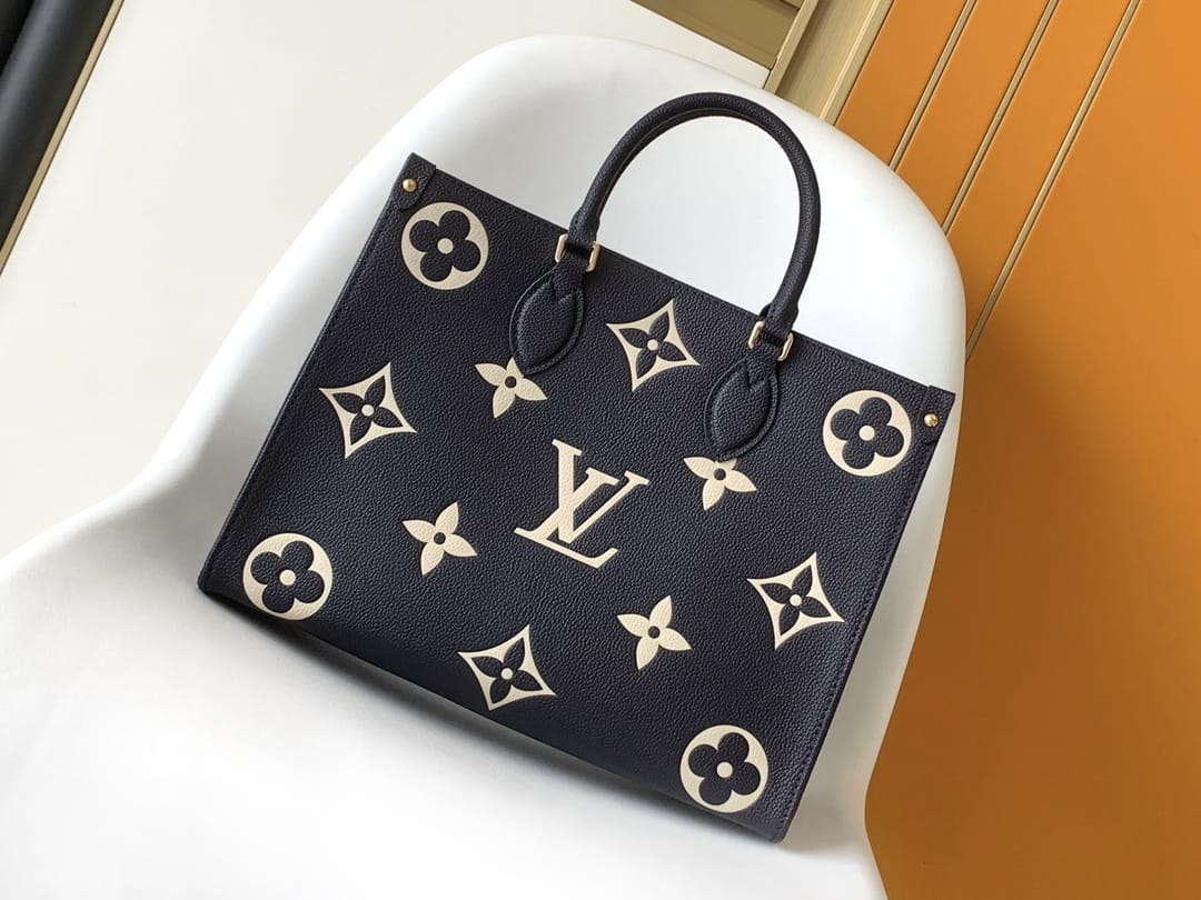 Louis Vuitton OnTheGo MM Toto Bag in Bicolor Monogram Empreinte Leather - Navy Blue/Cream