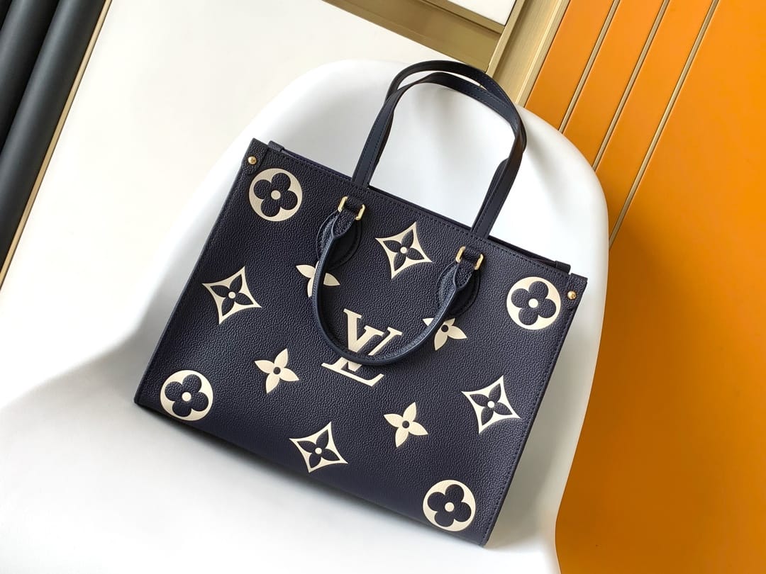 Louis Vuitton OnTheGo MM Toto Bag in Bicolor Monogram Empreinte Leather - Navy Blue/Cream