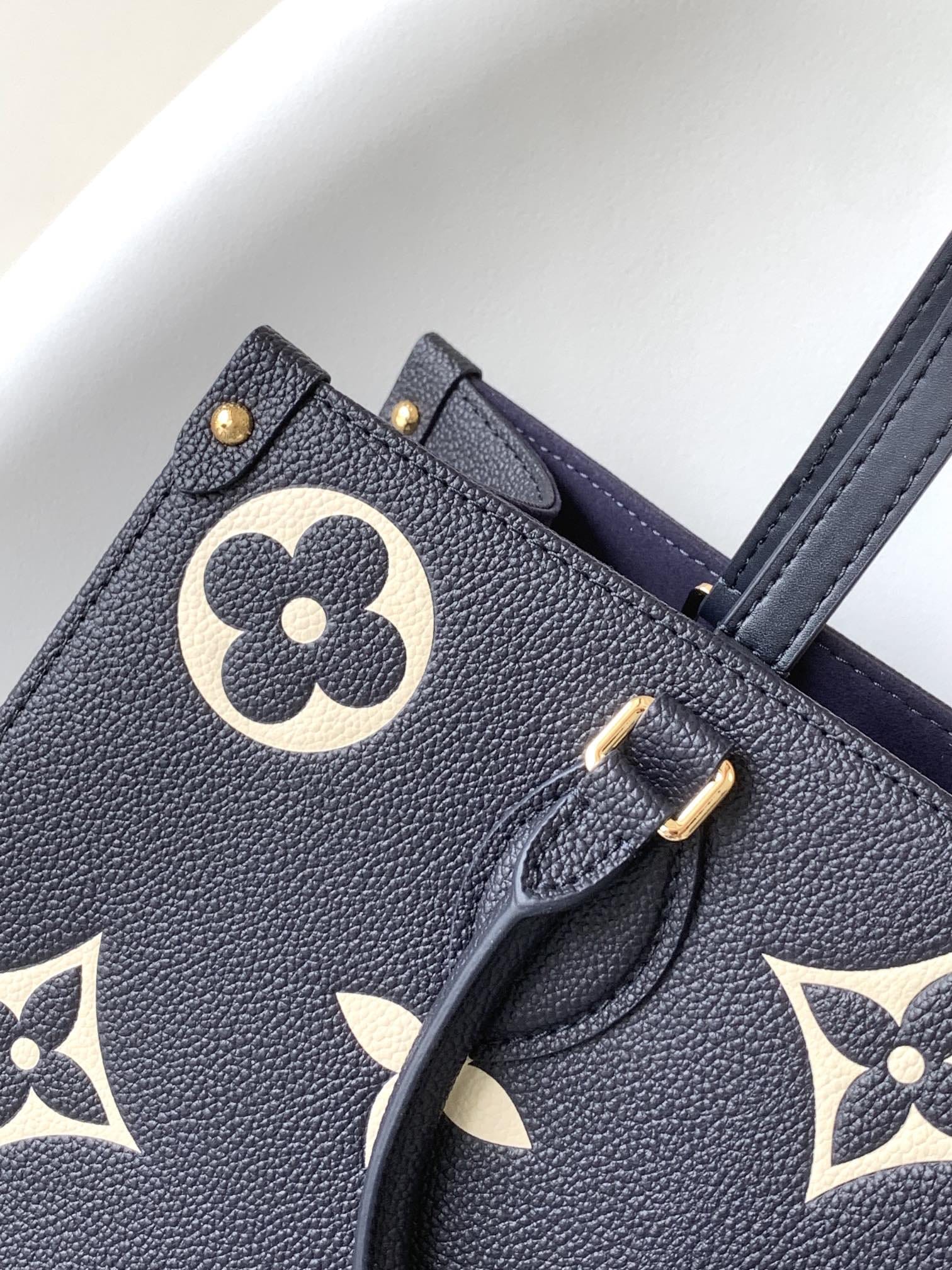 Louis Vuitton OnTheGo MM Toto Bag in Bicolor Monogram Empreinte Leather - Navy Blue/Cream