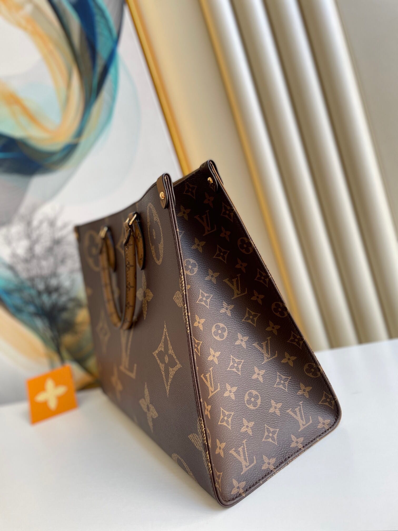 Louis Vuitton OnTheGo GM Toto Bag in Monogram Canvas