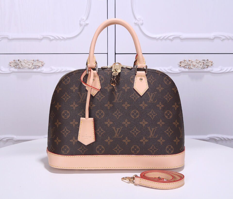 Louis Vuitton Alma PM Handbag in Monogram Coated Canvas