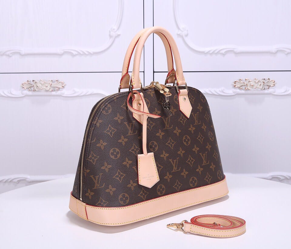 Louis Vuitton Alma PM Handbag in Monogram Coated Canvas