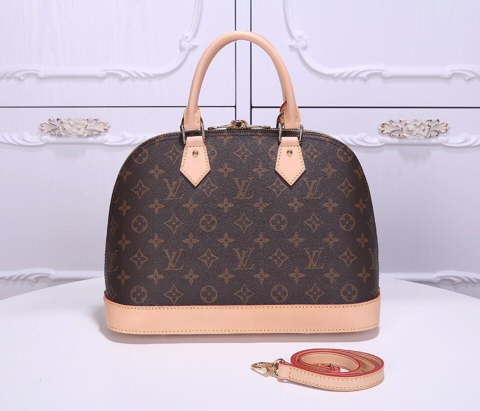 Louis Vuitton Alma PM Handbag in Monogram Coated Canvas