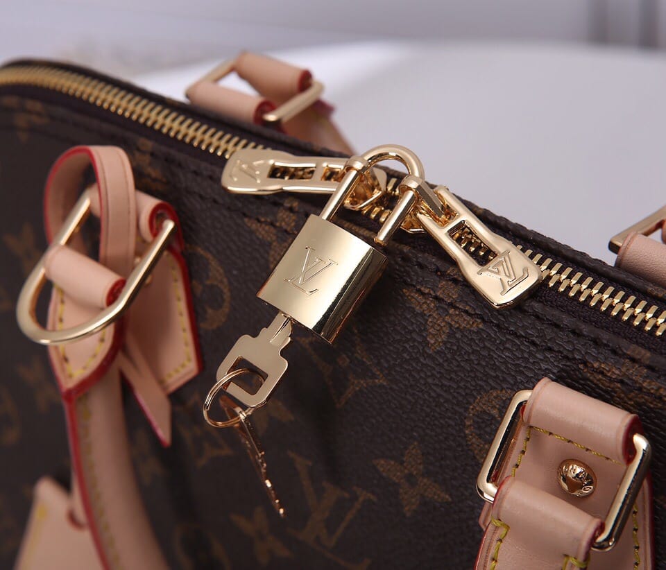 Louis Vuitton Alma PM Handbag in Monogram Coated Canvas