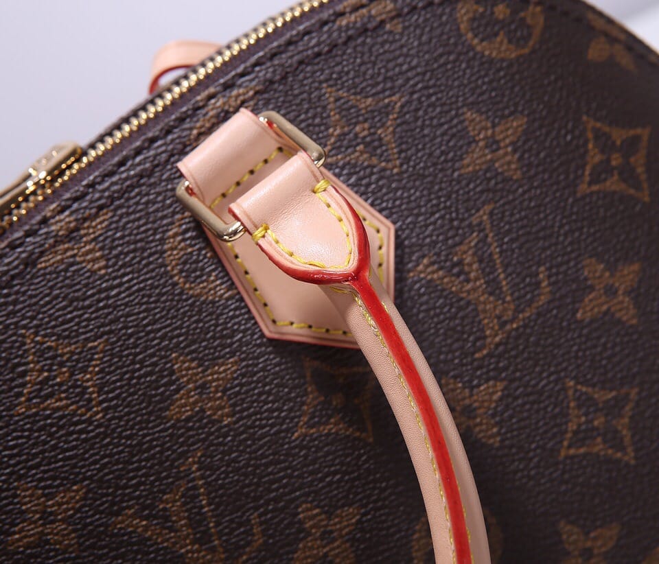 Louis Vuitton Alma PM Handbag in Monogram Coated Canvas