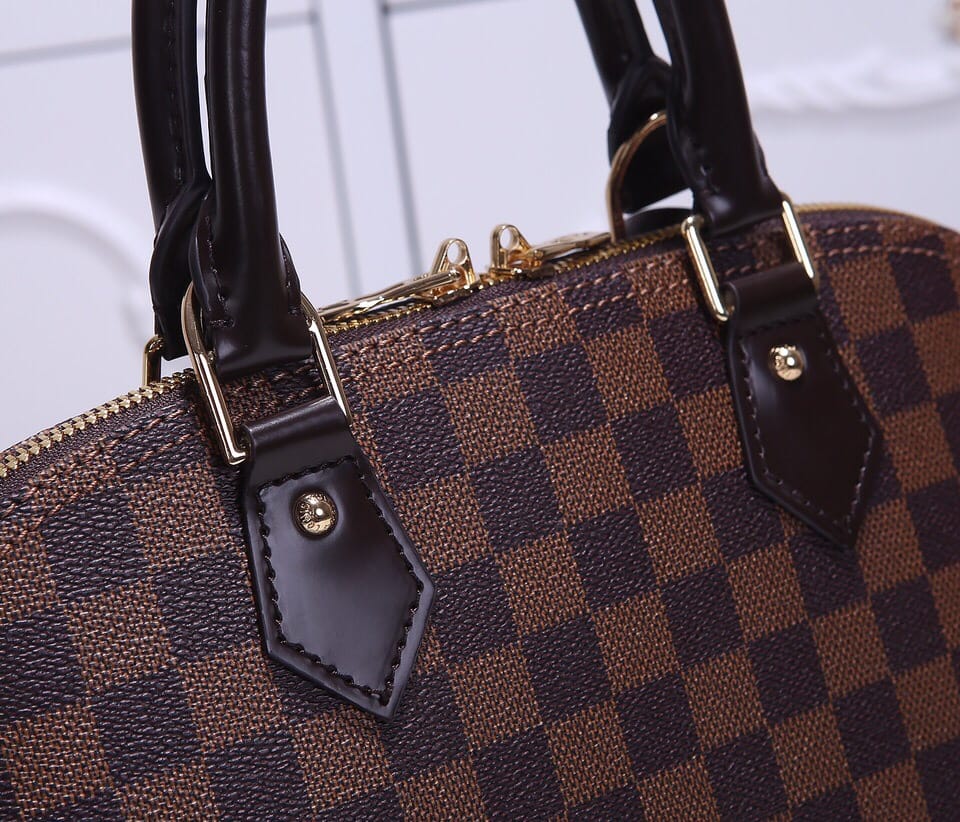 Louis Vuitton Alma PM Handbag in Damier Ebene Coated Canvas