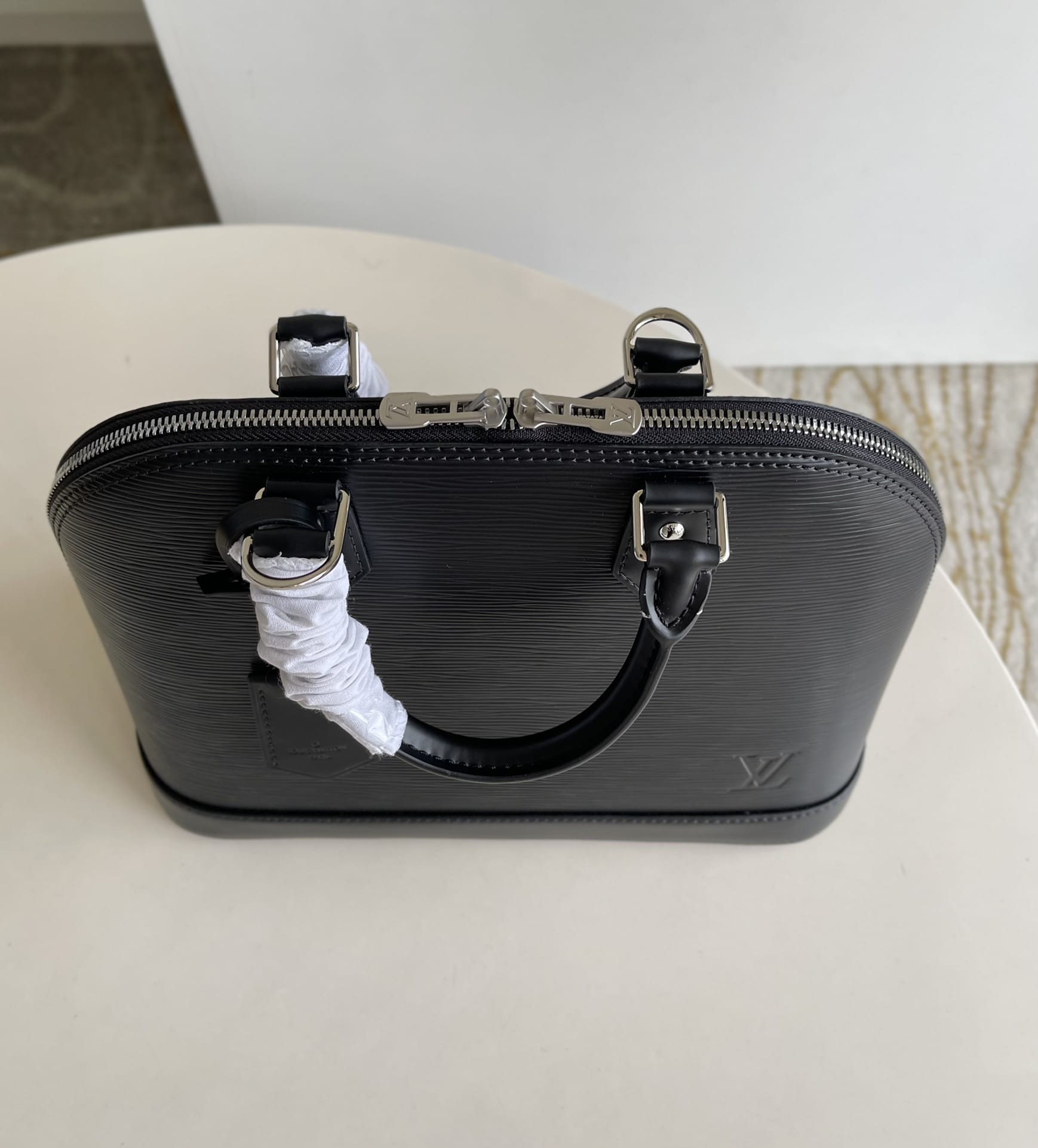 Louis Vuitton Alma PM Handbag in Epi Leather - Black