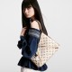 Louis Vuitton CarryAll PM Shoulder Bag in Monogram Jacquard Fabric - Multicolor Beige