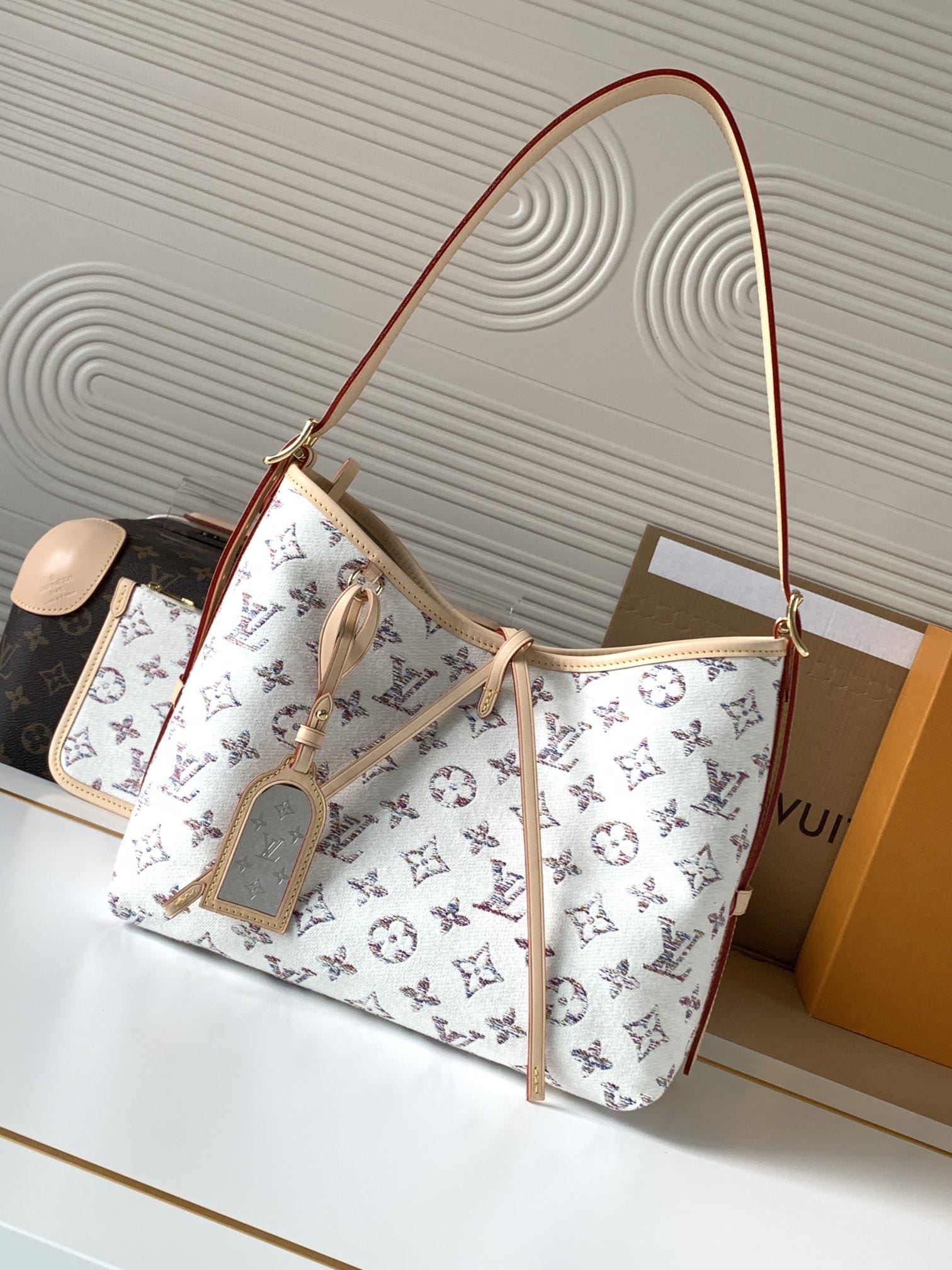 Louis Vuitton CarryAll PM Shoulder Bag in Monogram Jacquard Fabric - Multicolor Beige