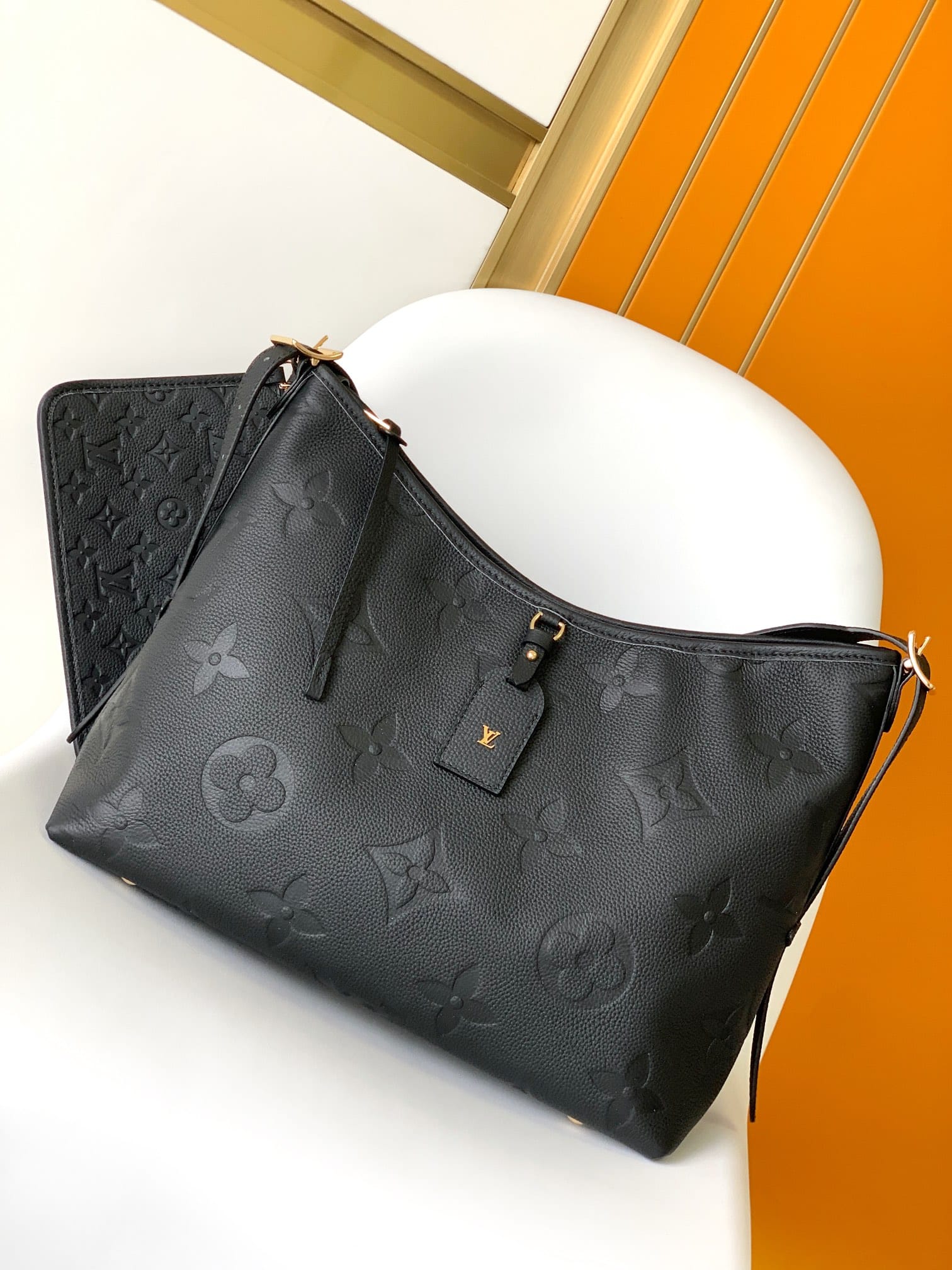 Louis Vuitton CarryAll MM Shoulder Bag in Monogram Empreinte Leather - Black