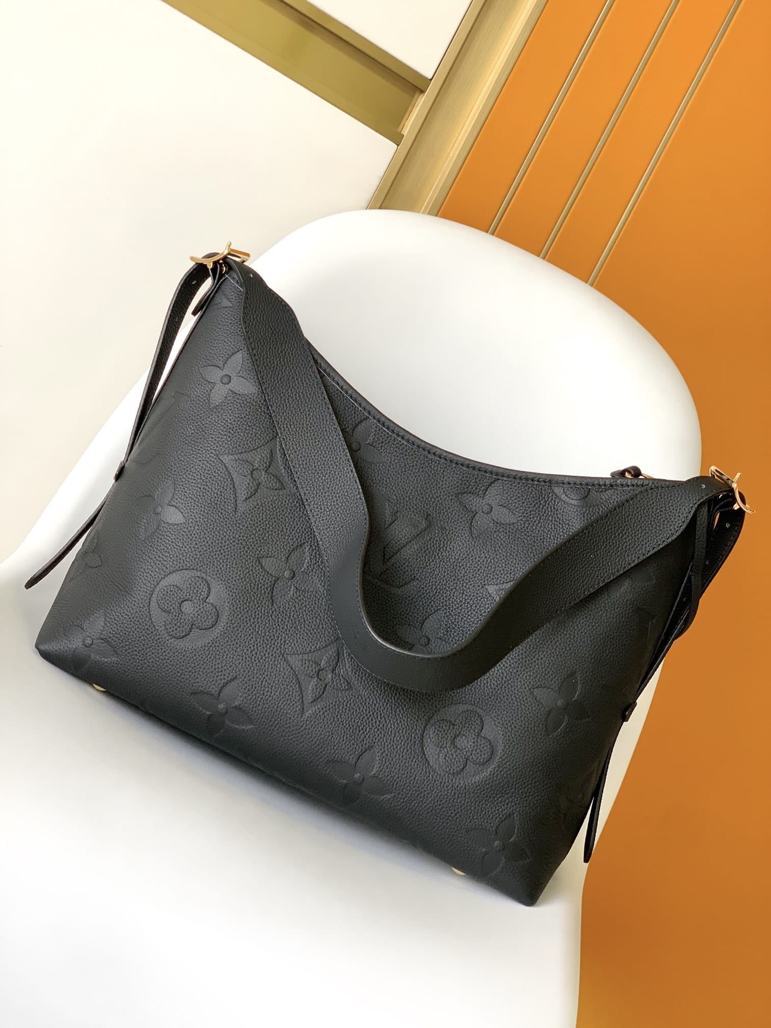 Louis Vuitton CarryAll MM Shoulder Bag in Monogram Empreinte Leather - Black