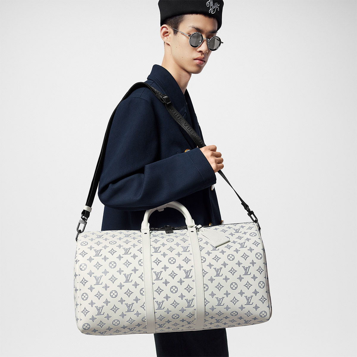 Louis Vuitton Keepall Bandoulière 50 Bag in Monogram Shadow Leather - White/Navy Blue