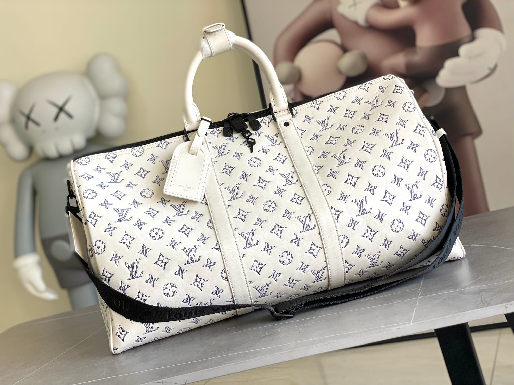 Louis Vuitton Keepall Bandoulière 50 Bag in Monogram Shadow Leather - White/Navy Blue