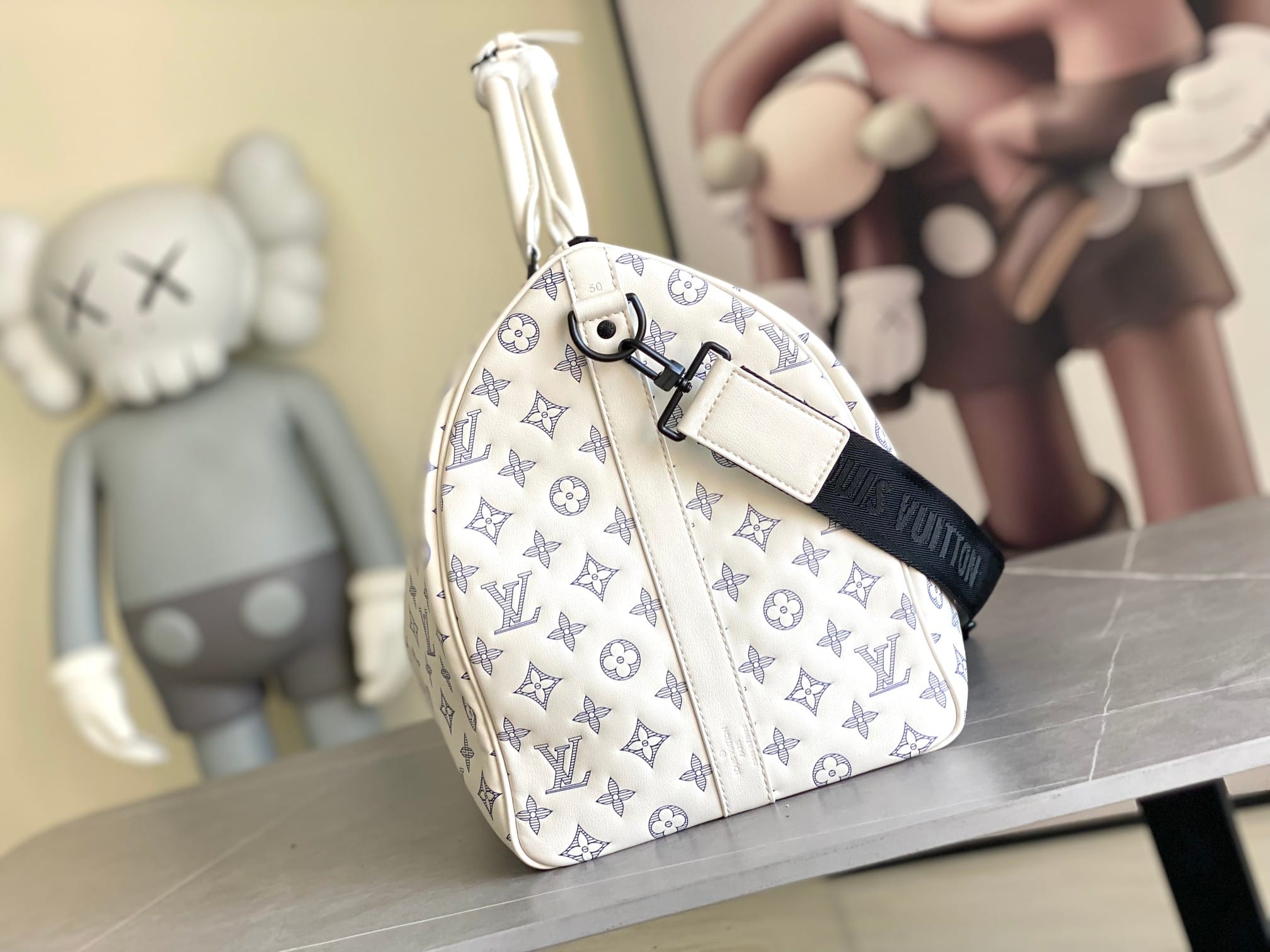 Louis Vuitton Keepall Bandoulière 50 Bag in Monogram Shadow Leather - White/Navy Blue