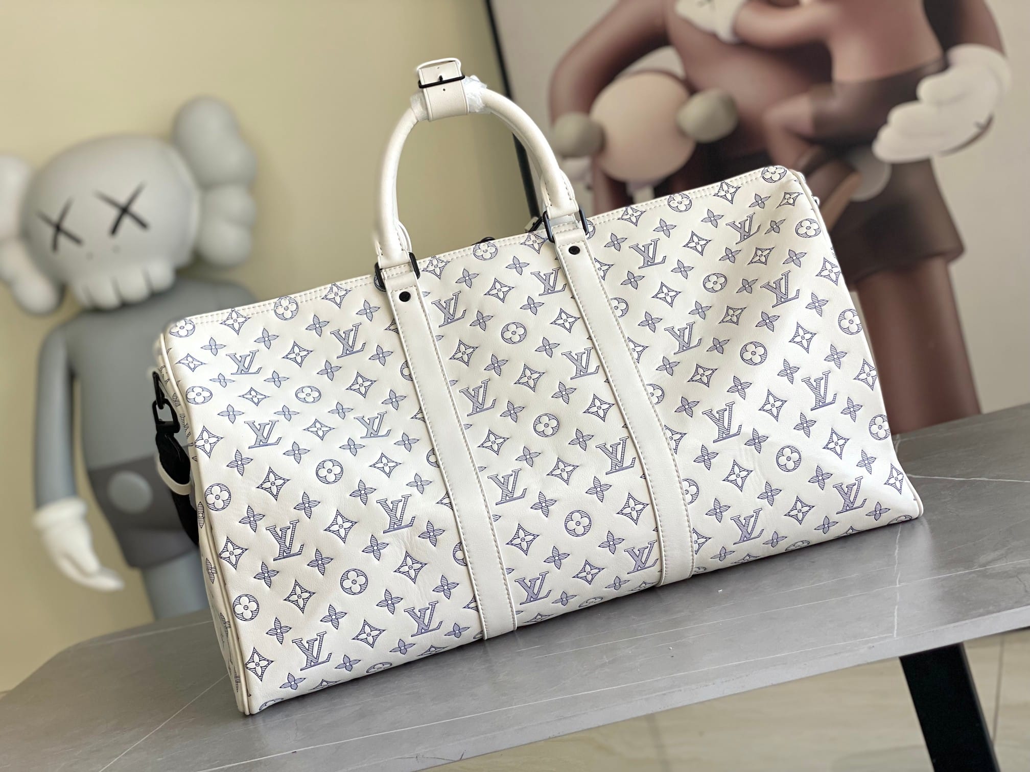 Louis Vuitton Keepall Bandoulière 50 Bag in Monogram Shadow Leather - White/Navy Blue