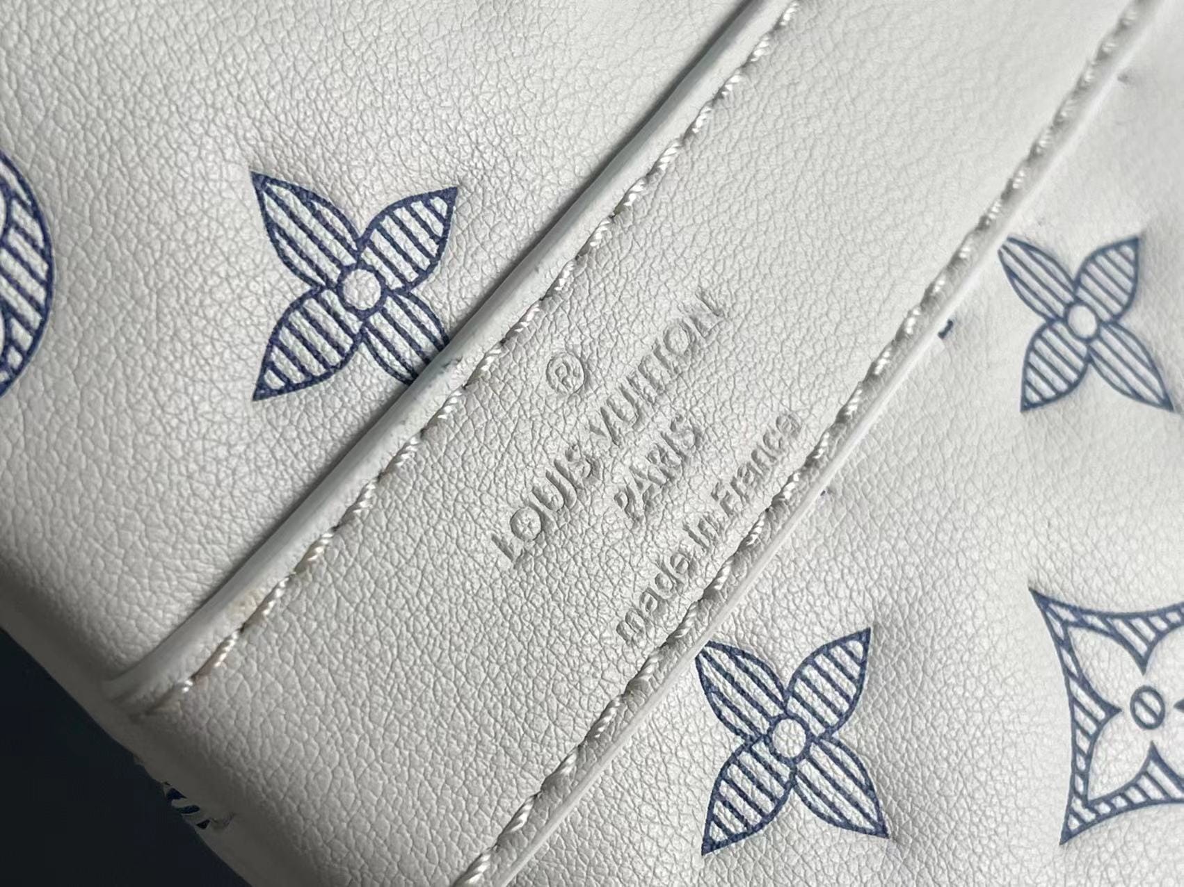 Louis Vuitton Keepall Bandoulière 50 Bag in Monogram Shadow Leather - White/Navy Blue