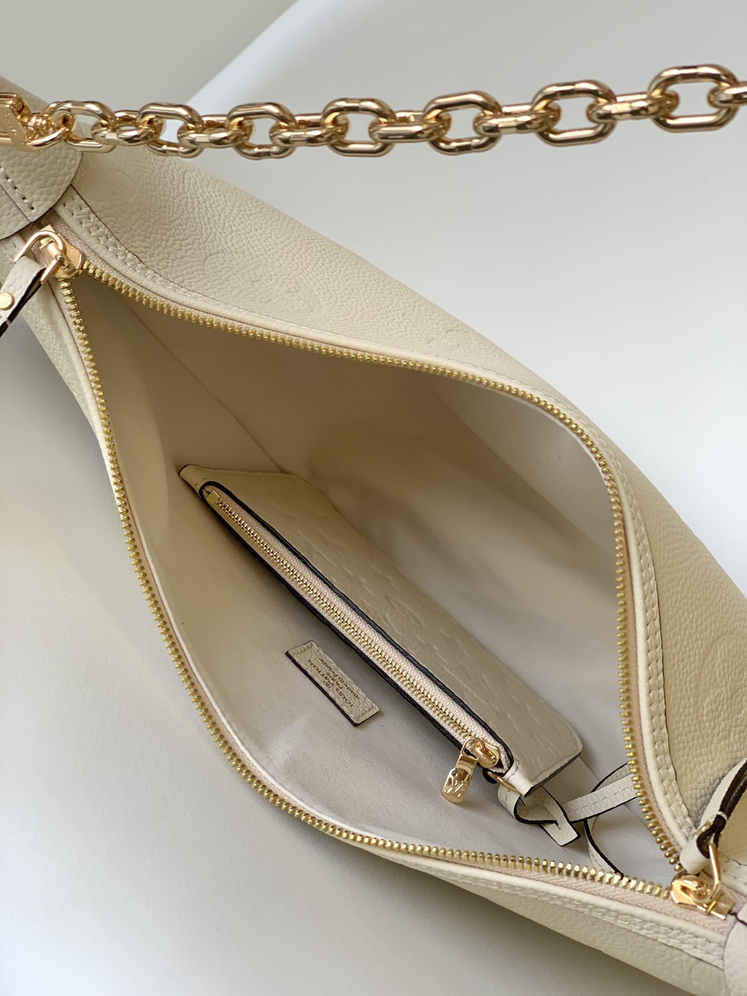 Louis Vuitton Loop Hobo Bag in Monogram Empreinte Leather - Cream