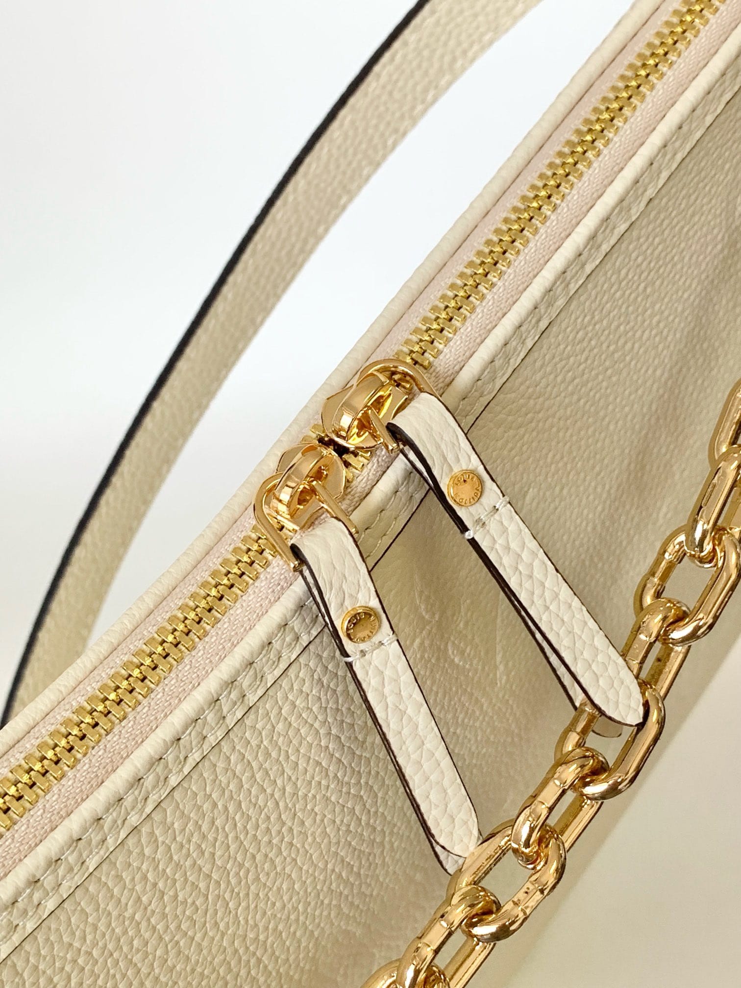 Louis Vuitton Loop Hobo Bag in Monogram Empreinte Leather - Cream