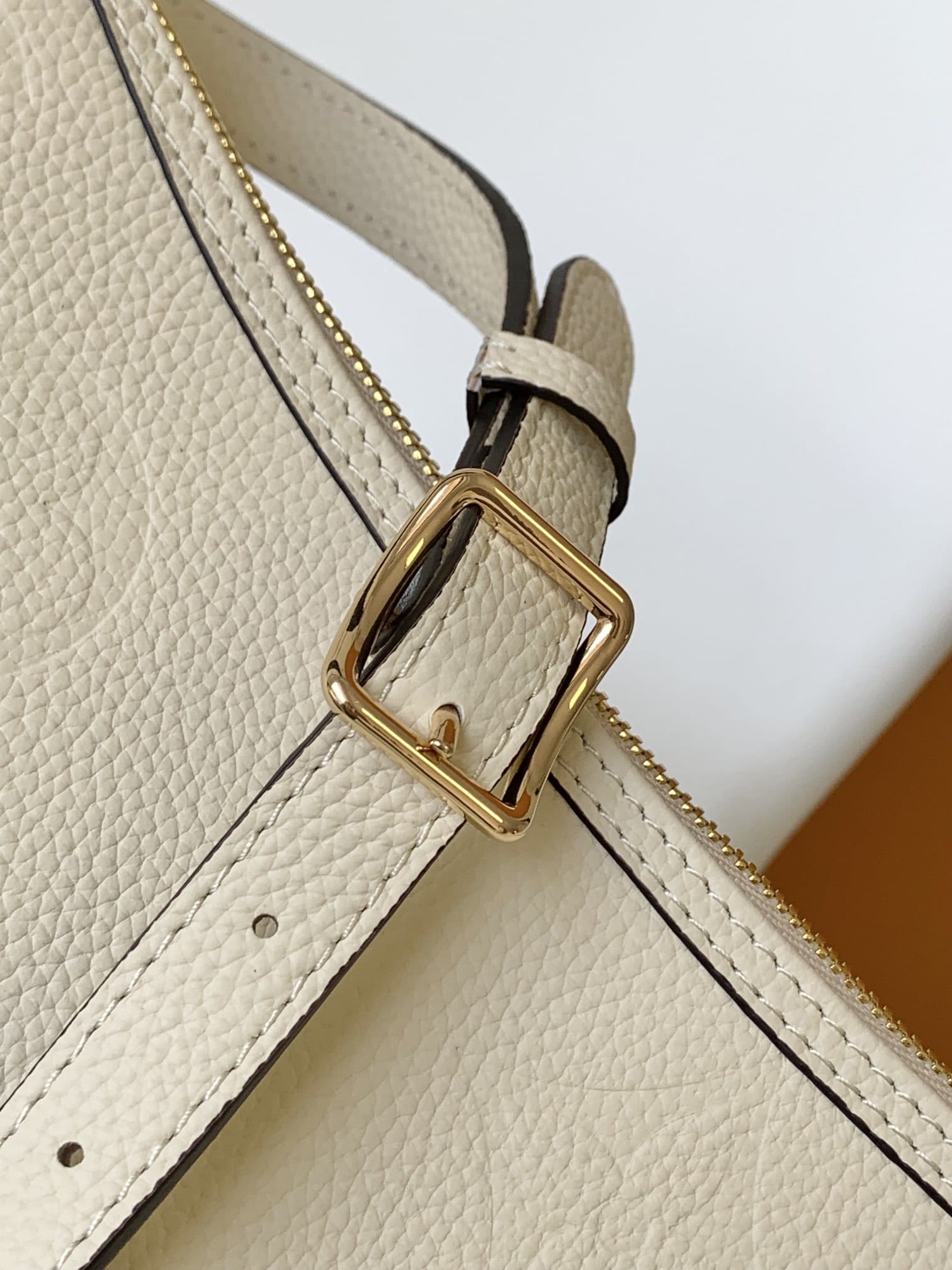 Louis Vuitton Loop Hobo Bag in Monogram Empreinte Leather - Cream