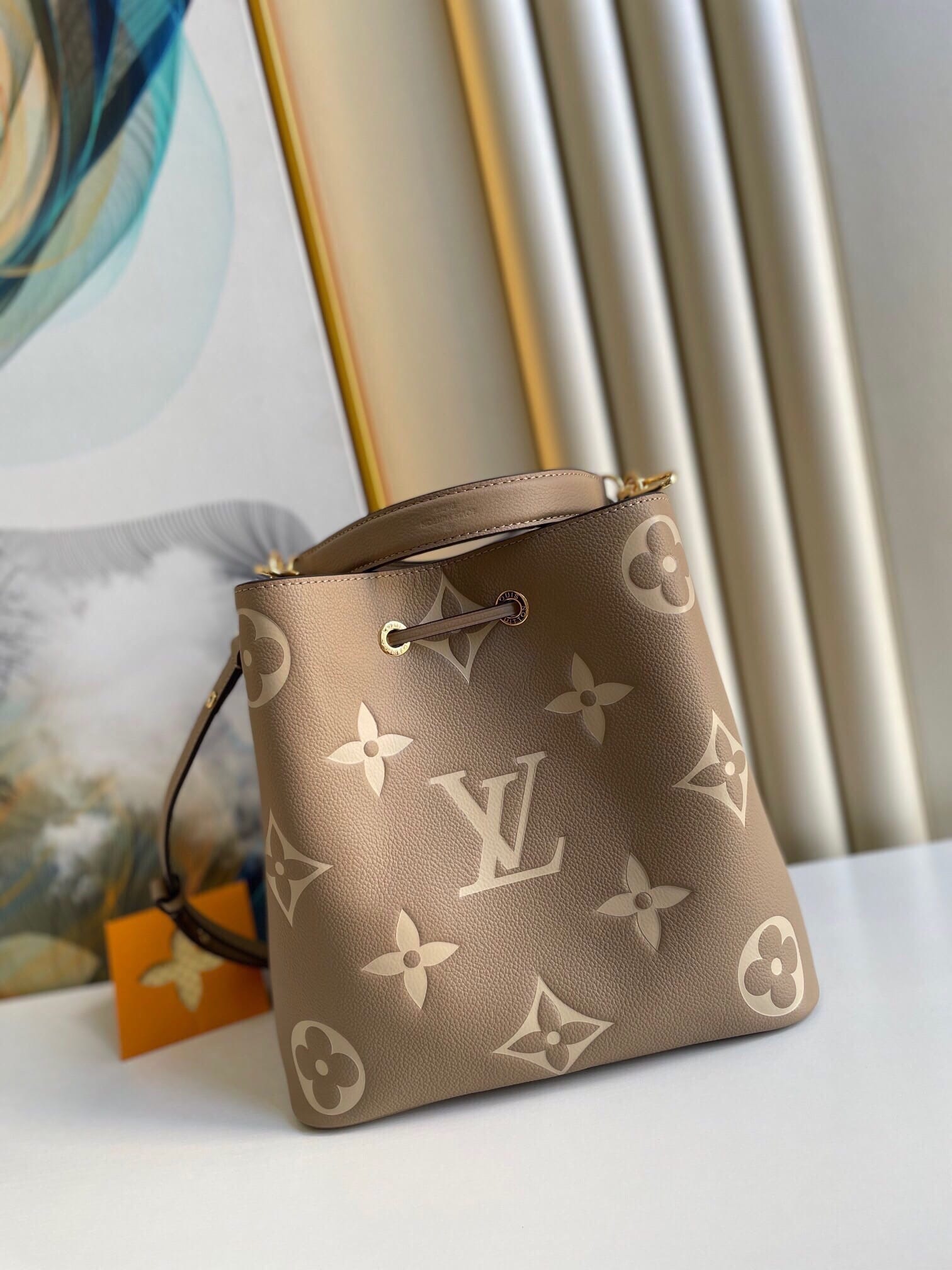 Louis Vuitton NéoNoé MM Bucket Bag in Bicolor Monogram Empreinte Leather - Gray/Cream